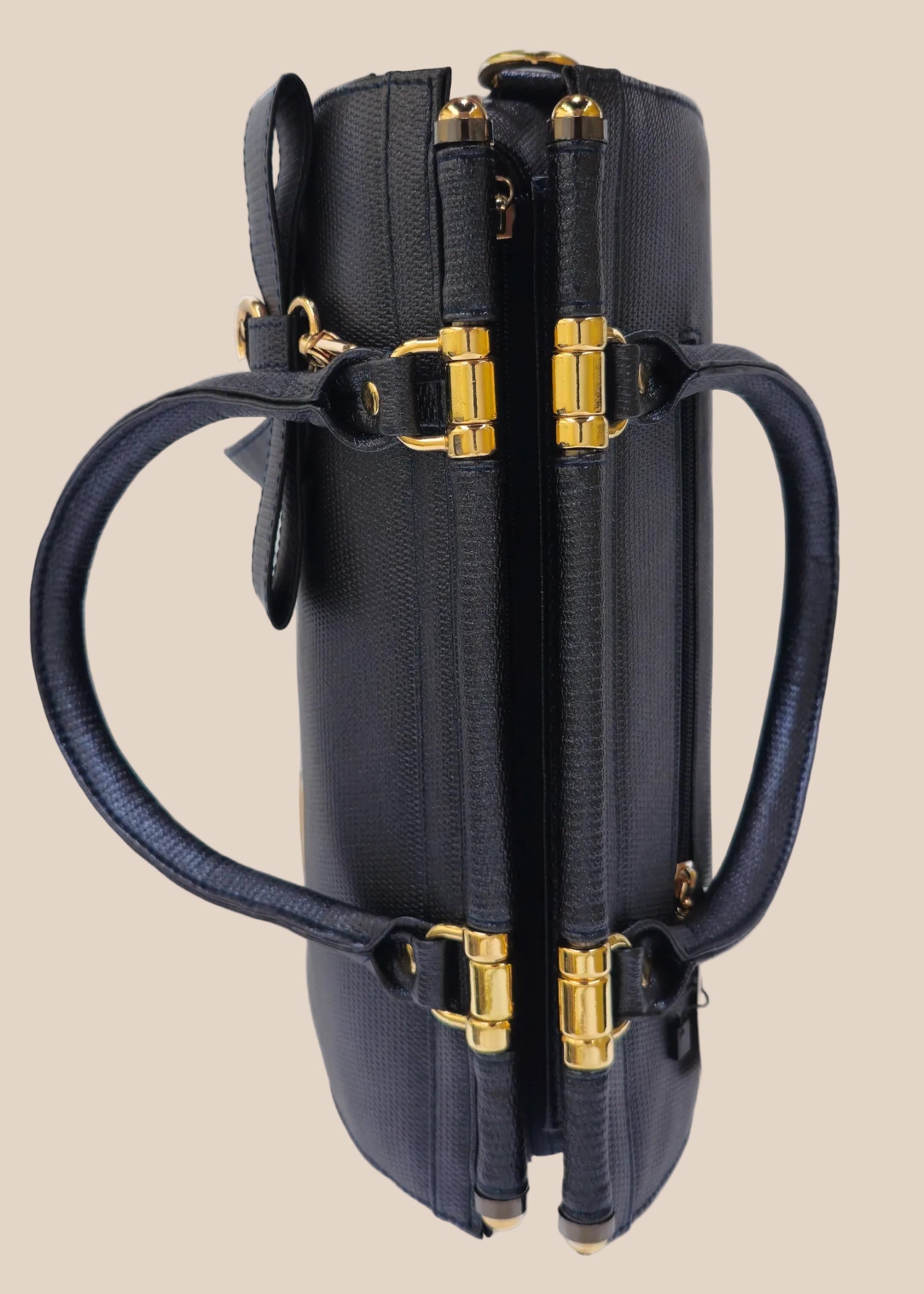 Blue handbag with gold accents, top view