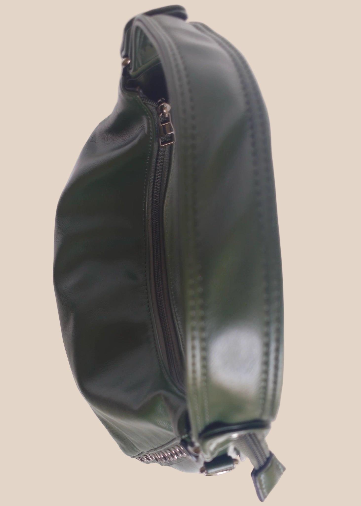 Green handbag with studded details top view