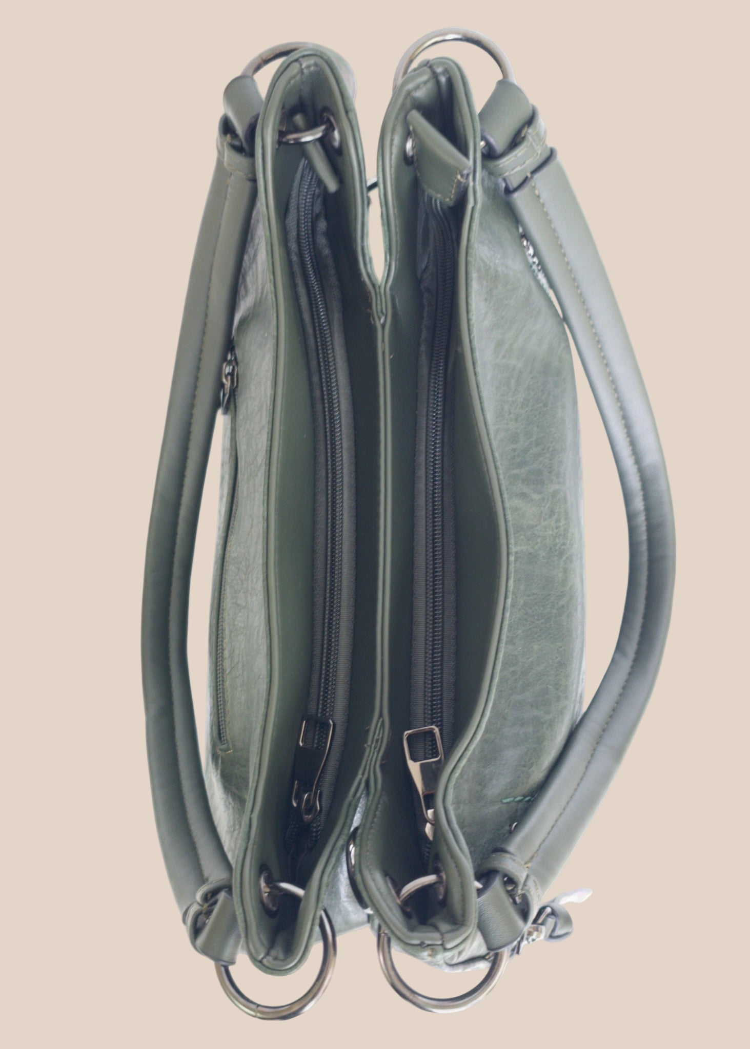 Beige handbag with a floral pattern and a gold handle top view