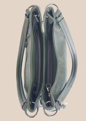 Beige handbag with a floral pattern and a gold handle top view